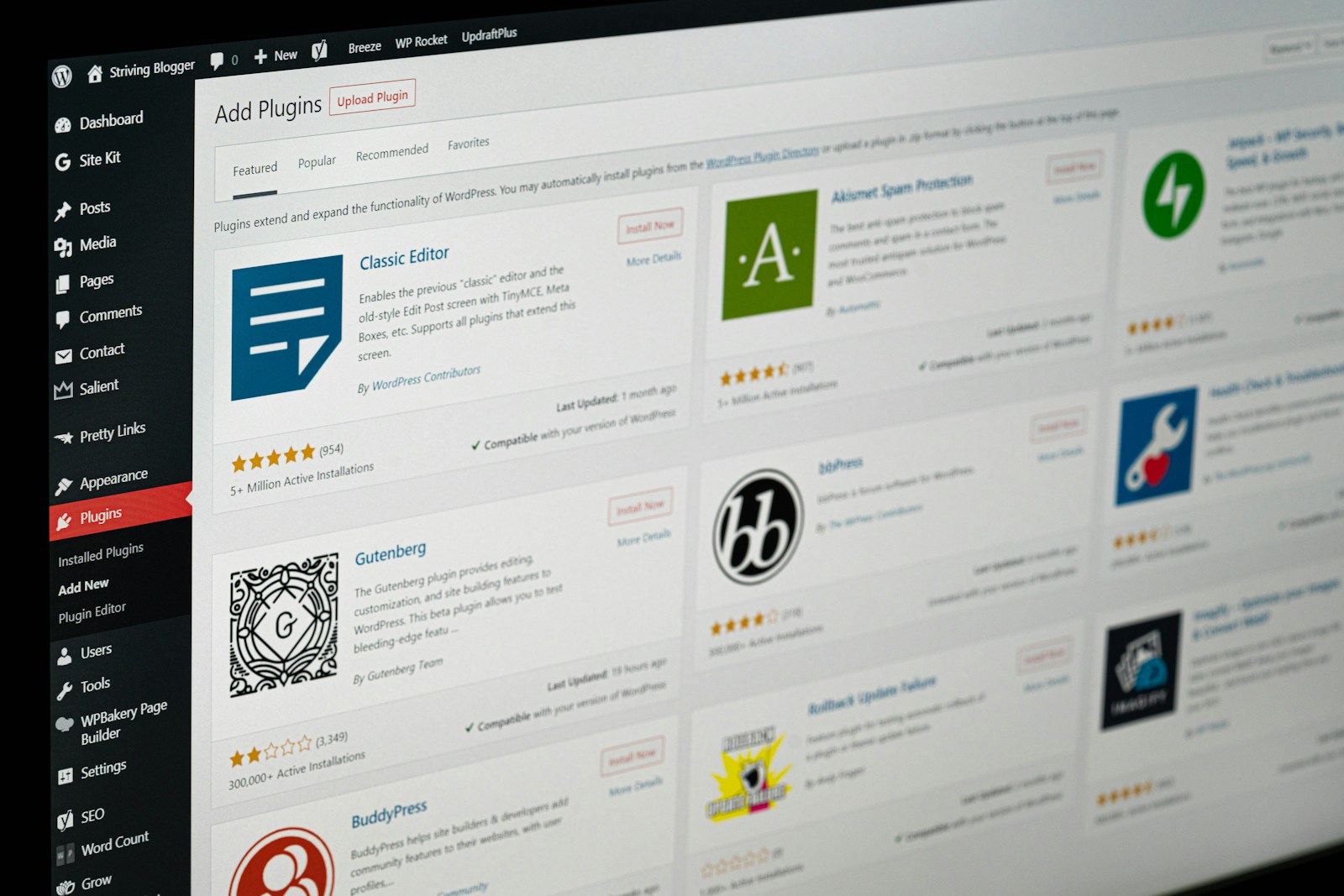 a computer screen with a screen showing a WordPress website